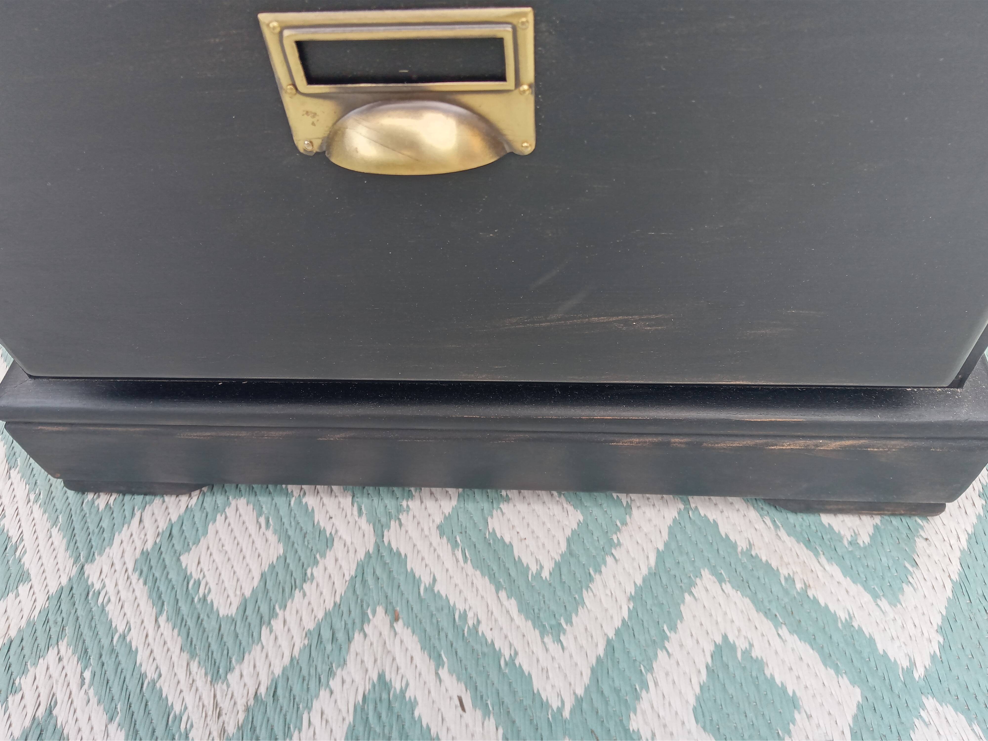 Black patina chest of drawers