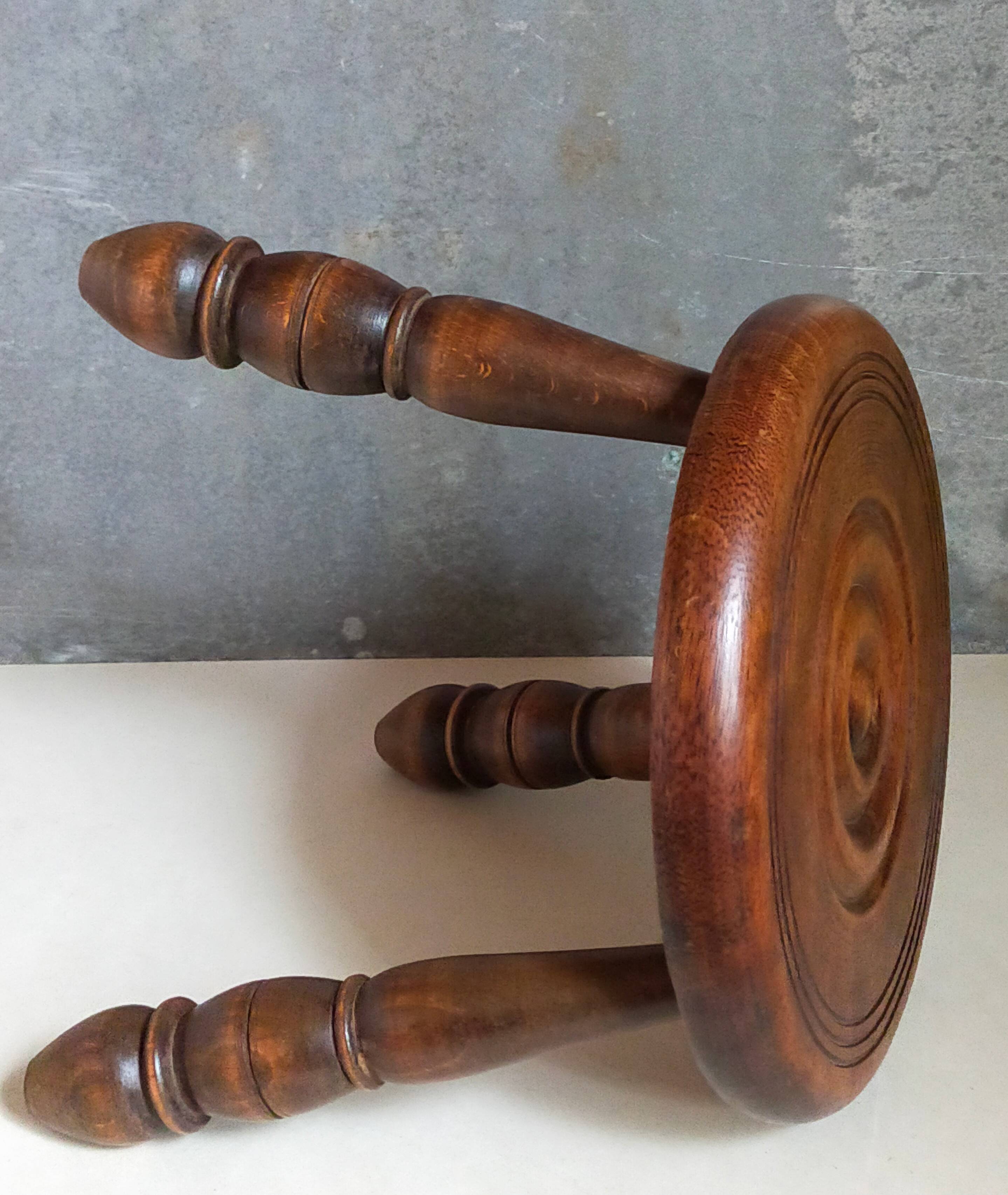 Low tripod stool in vintage turned solid wood