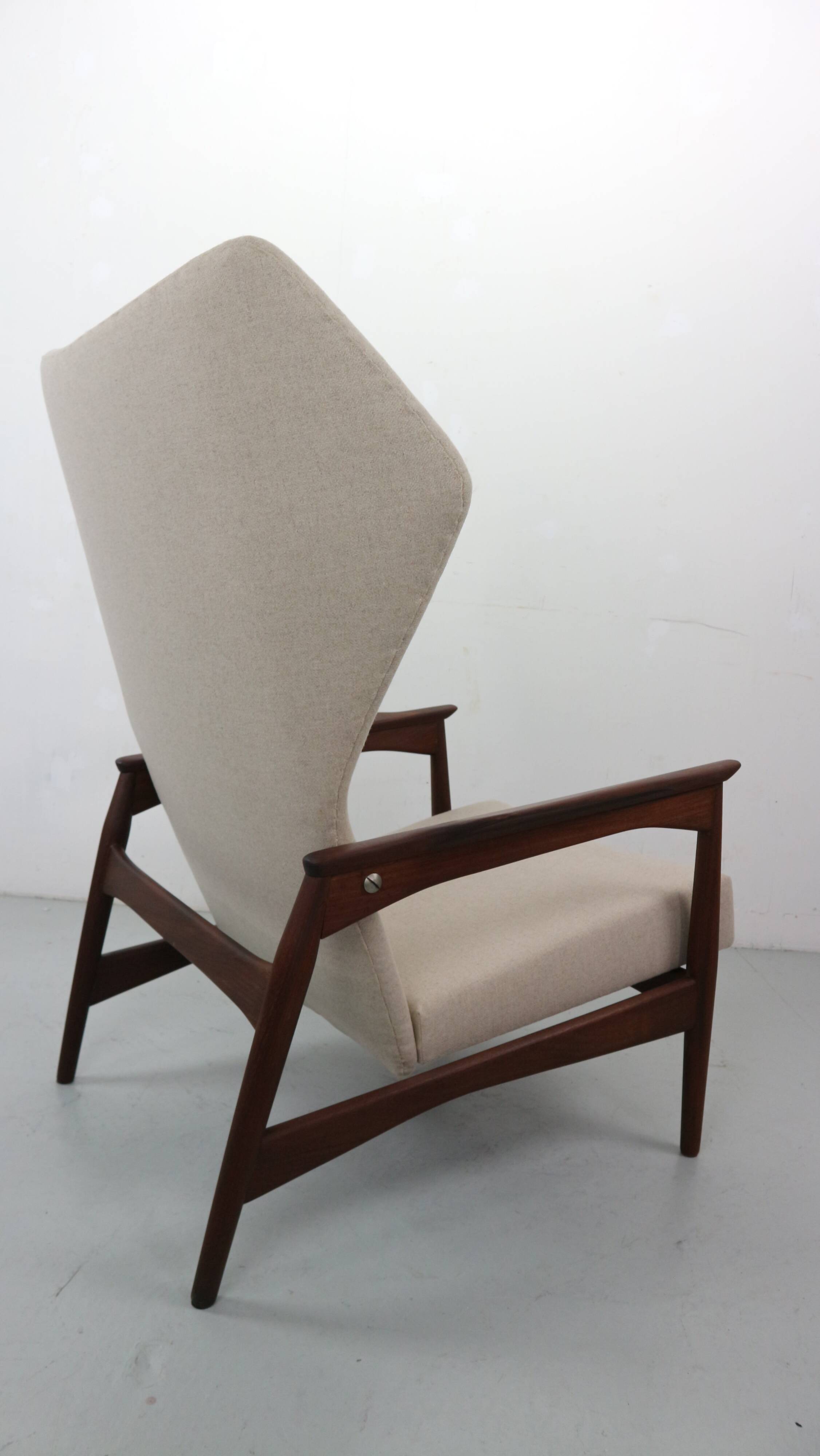 Danish adjustable wingback lounge chair in teak by Ib Kofod Larsen