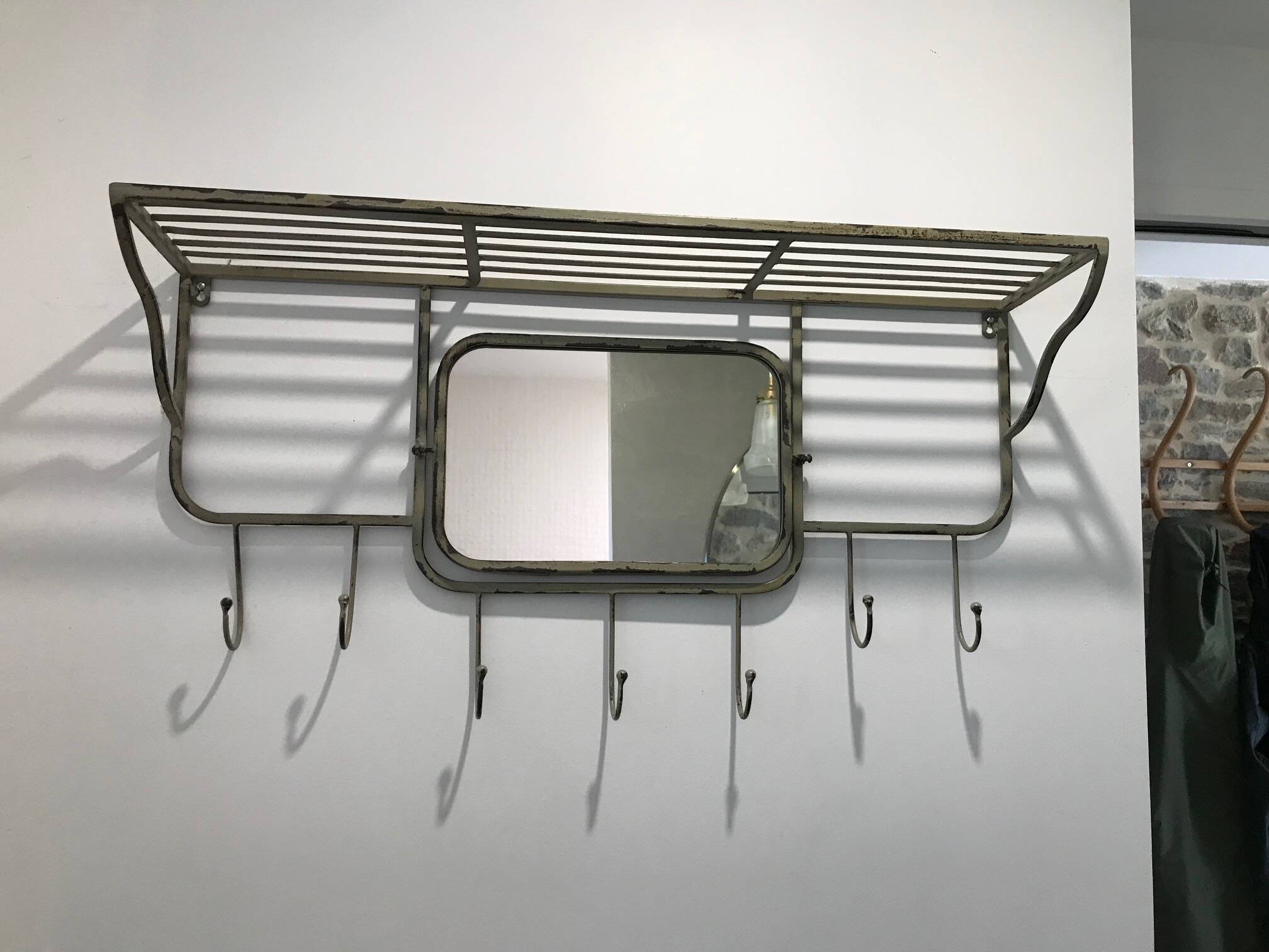 Gray-green patinated metal hat rack