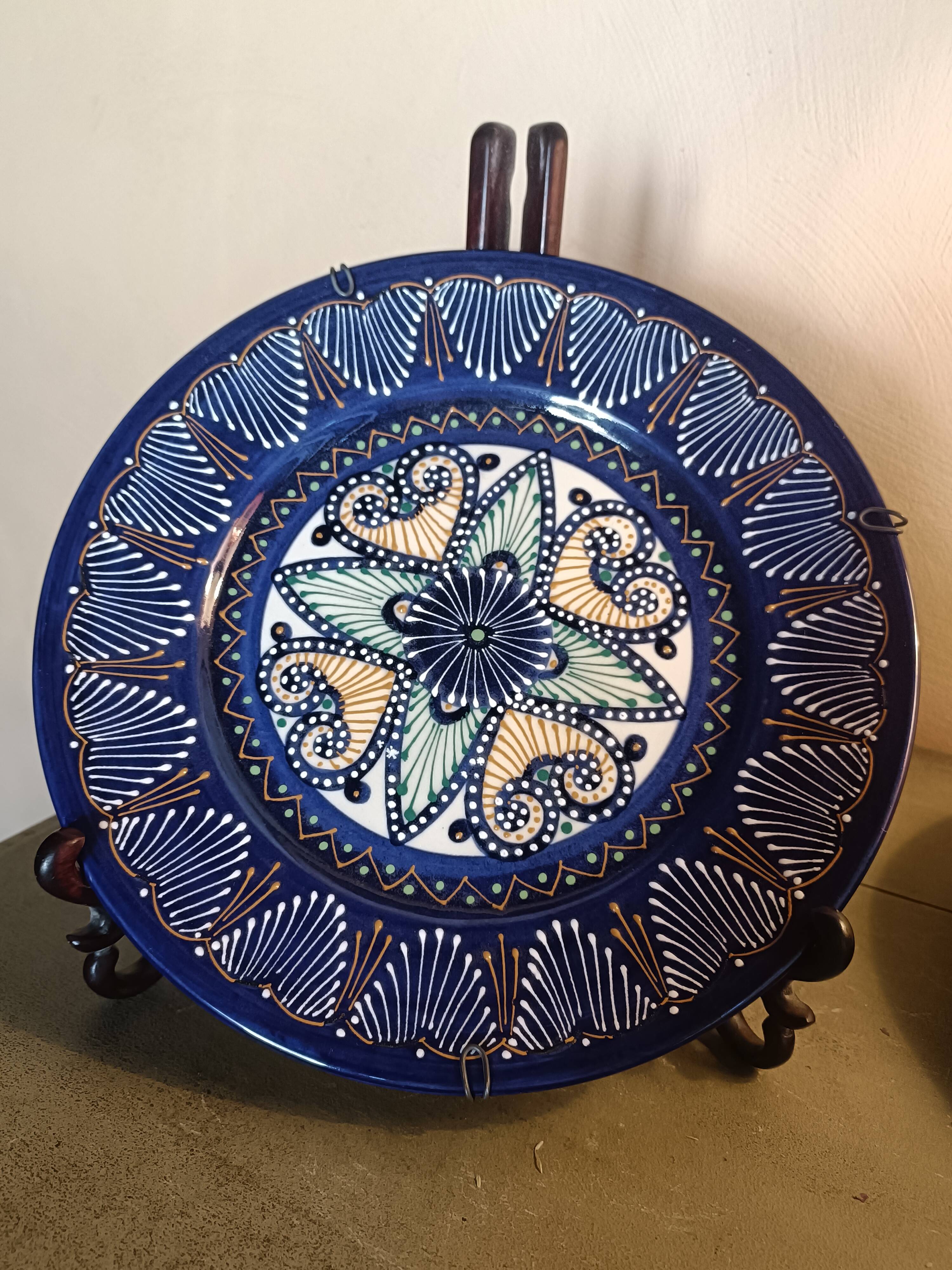 Two HB Quimper faience plates with pearl/embroidery decoration.