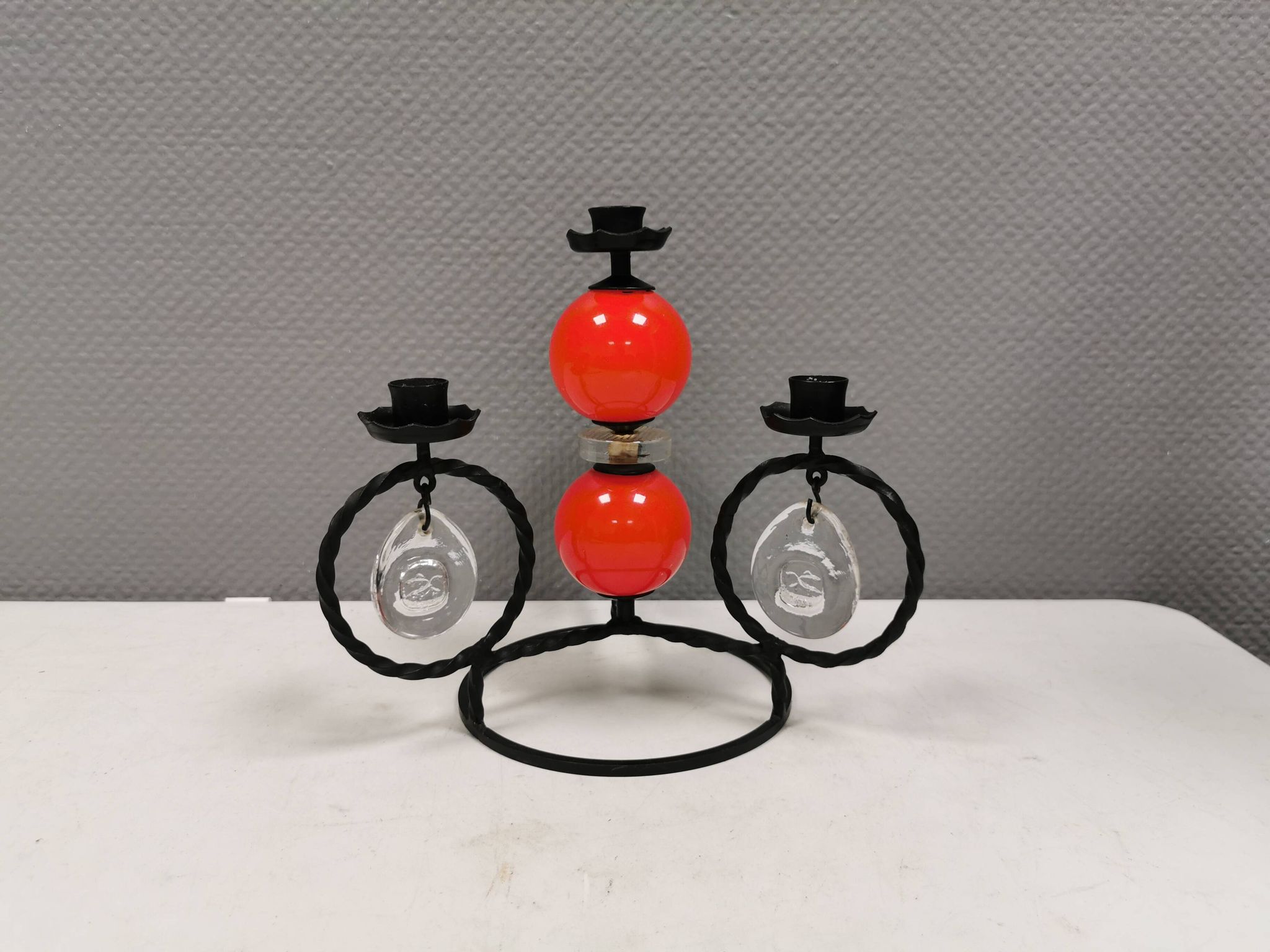 Wrought iron candle holder for 4 candles. by Erik Höglund in the 1960s