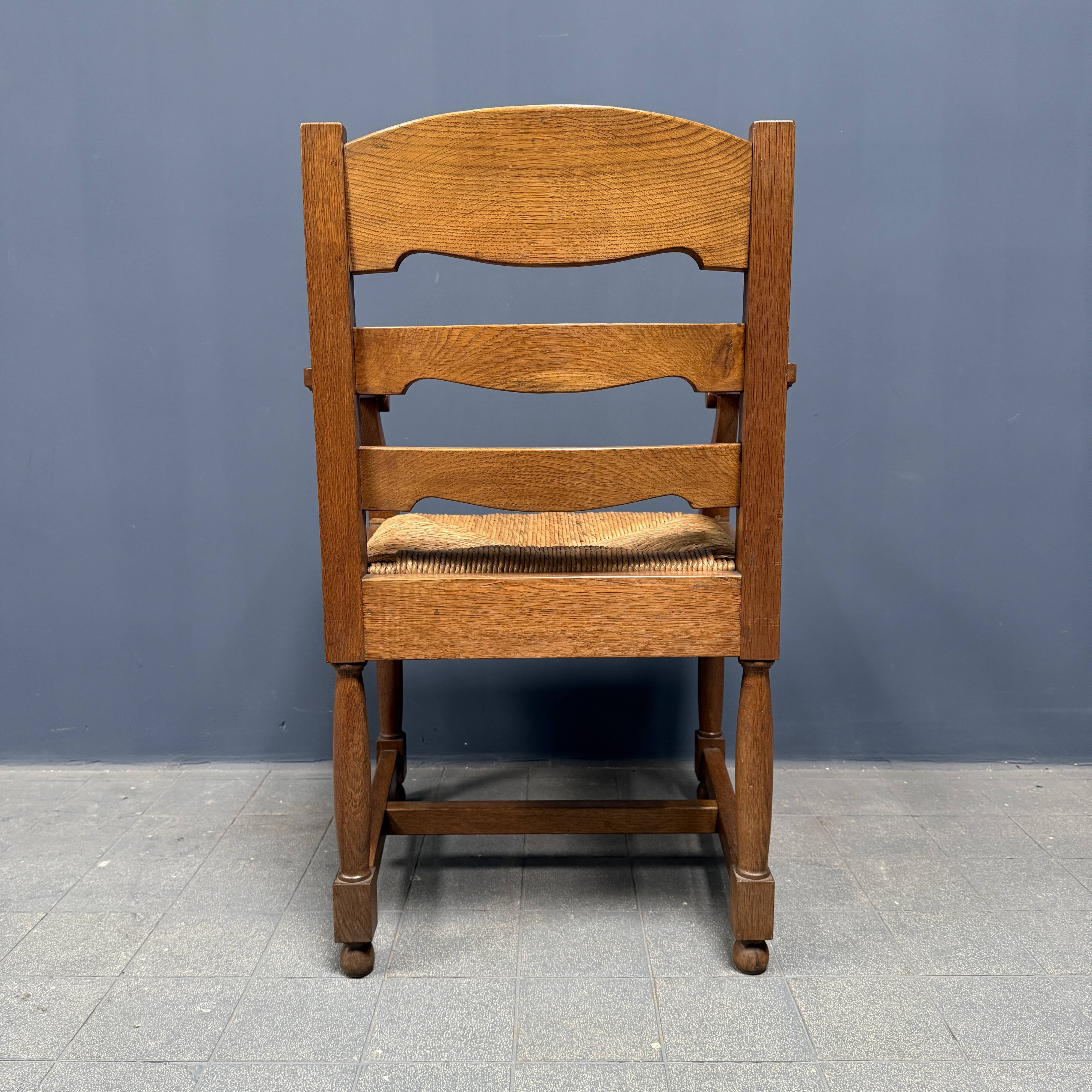 Set of two Dutch oak armchairs with rush seats