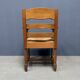 Ensemble de deux fauteuils en chêne néerlandais avec sièges en paille.