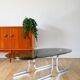 Oval coffee table in smoked glass and chrome, original double S design base, 1970.