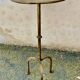 Henri POUENAT (1934-1987) Steel table or pedestal table with a golden patina