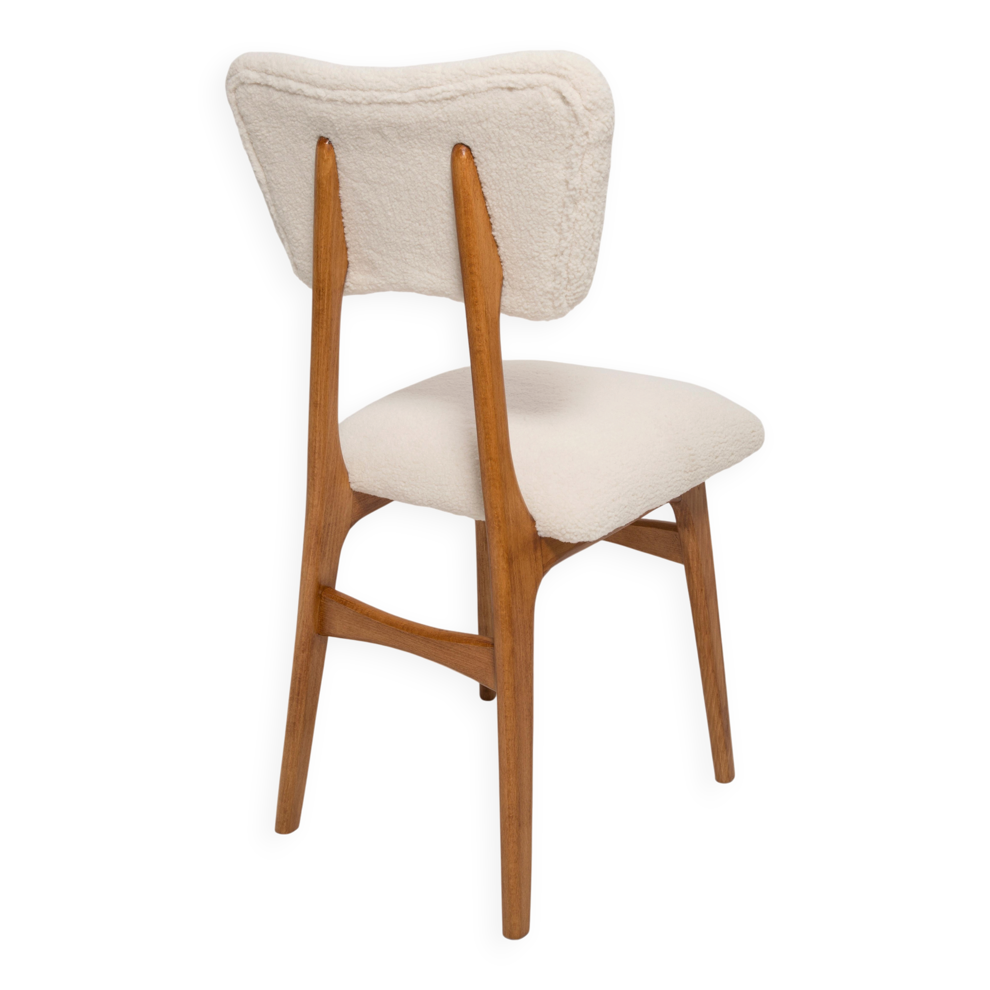Butterfly chair in beech wood and cream boucle, Europe, 1960