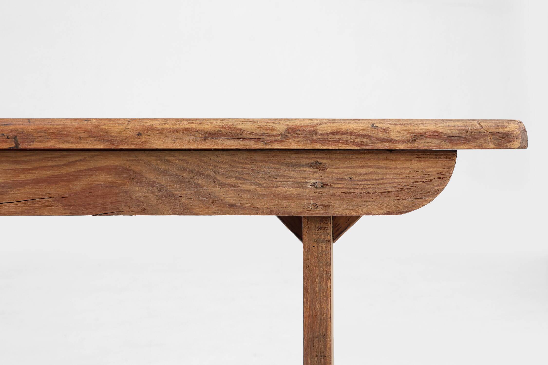 Rustic natural oak wooden bench with rounded details, France ca. 1900