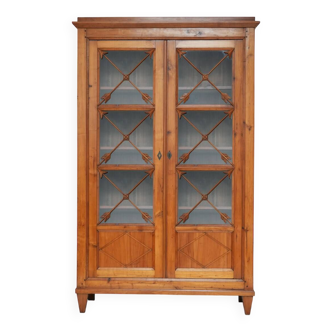 Blond wood cabinet with glass doors, 1970s.