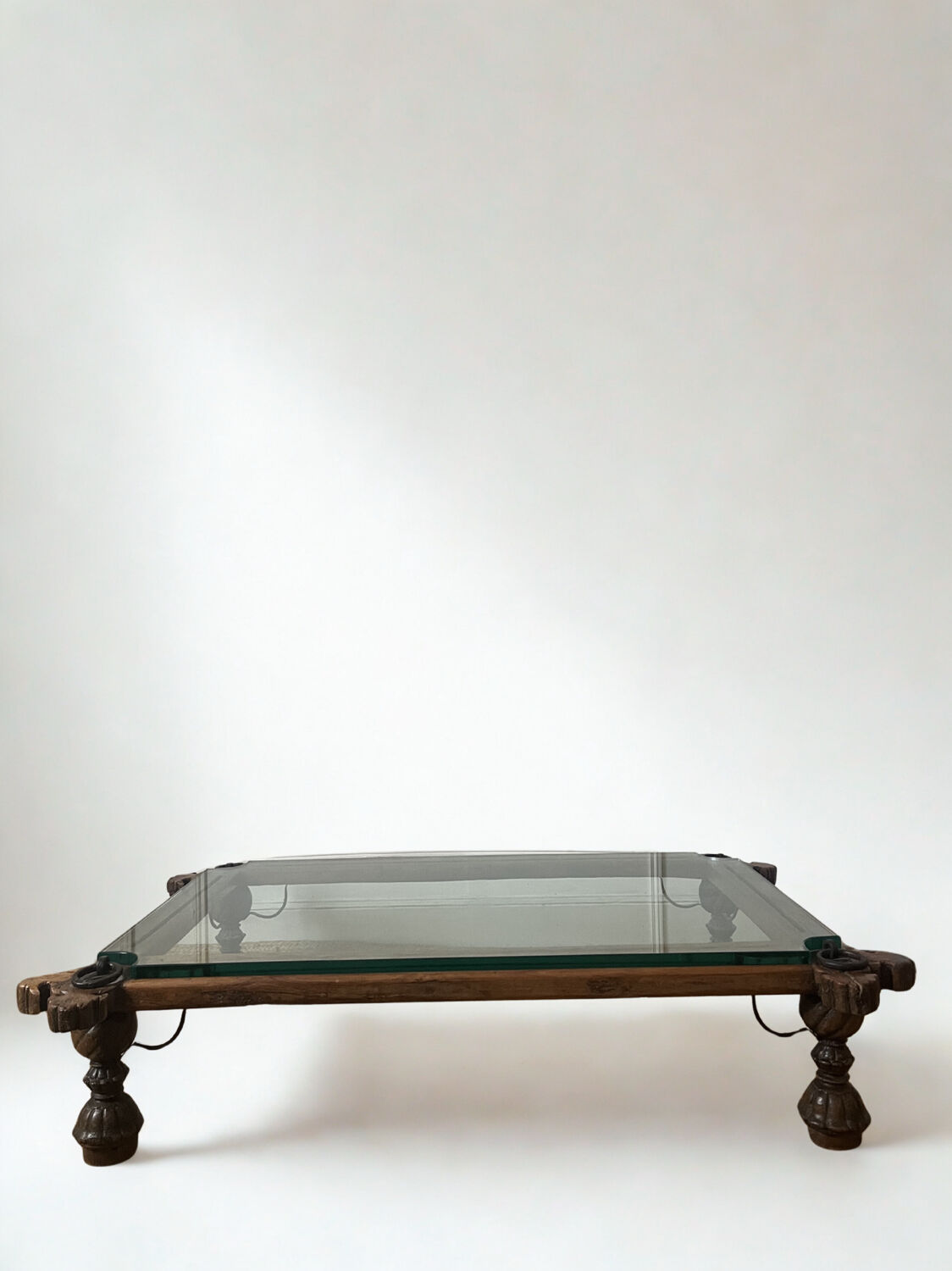 Indian coffee table made of wood and wrought iron.