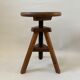 Wooden tripod stool with vintage screw