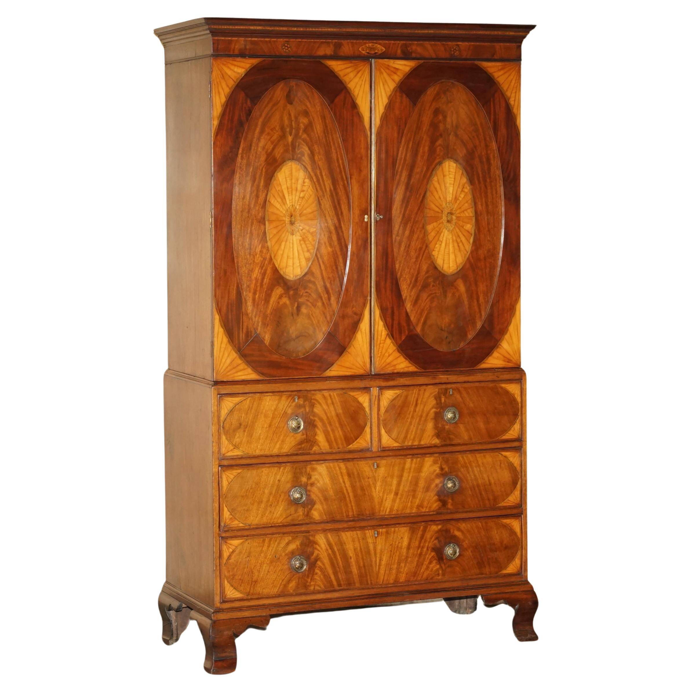 George III Sheraton linen cupboard in walnut, circa 1760.
