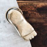 Solid brass ashtray in the shape of a foot