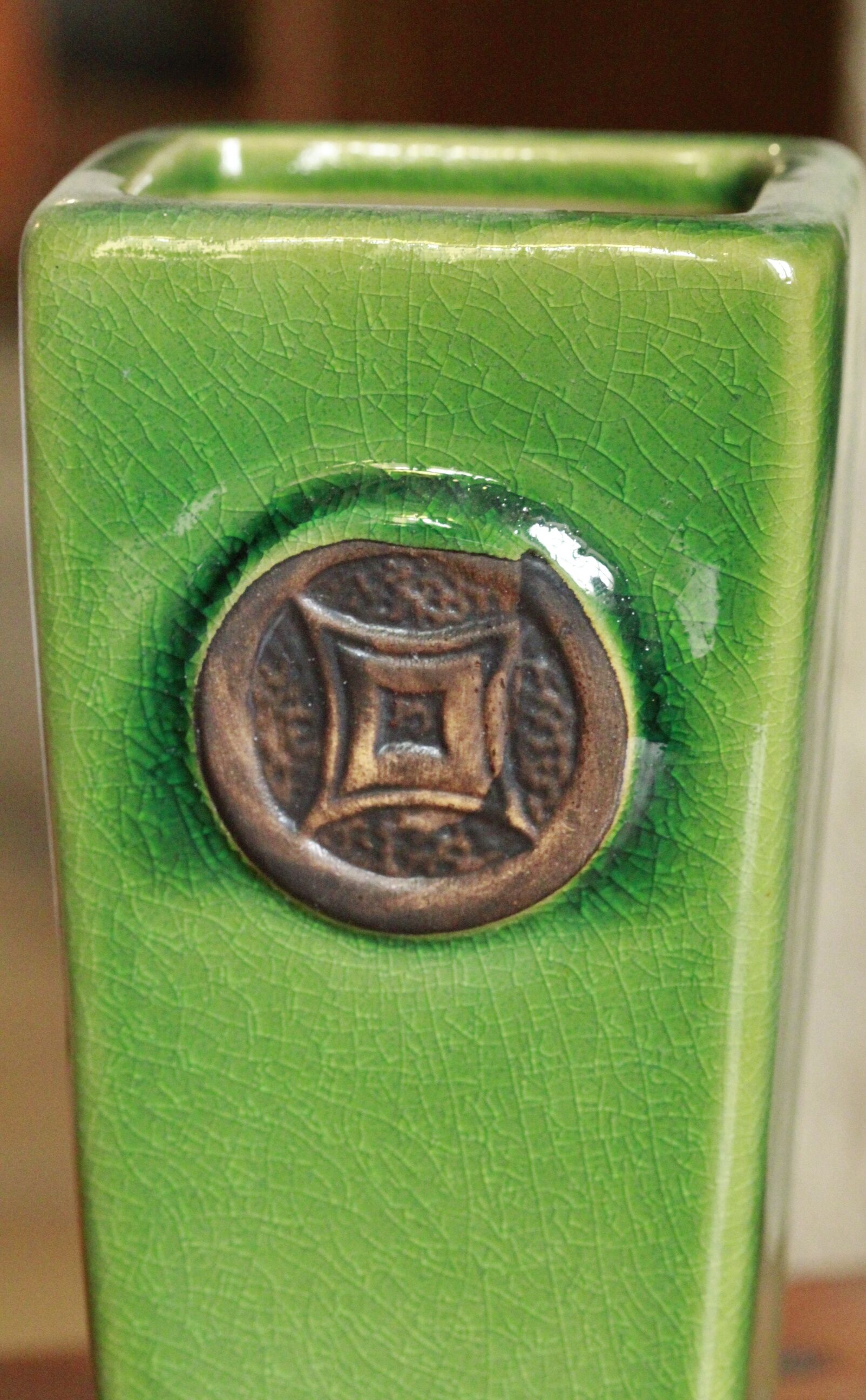 Green cracked ceramic vase