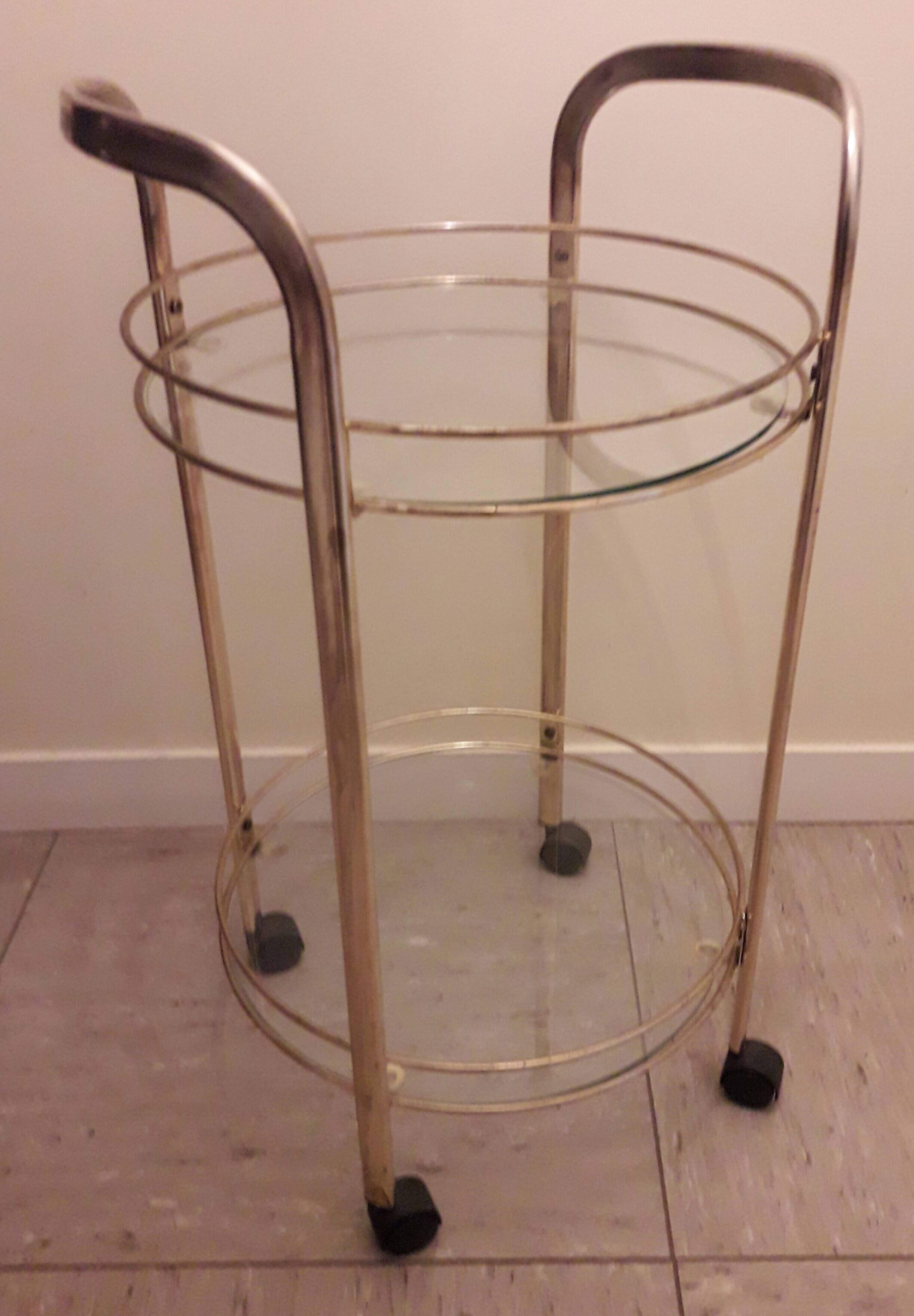 Rolling service in gilded metal and glass