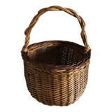 Small round wicker basket with one handle