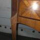 Small curved chest of drawers in Louis XV style with marquetry.