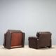 Pair of brown leather armchairs "Coronado"