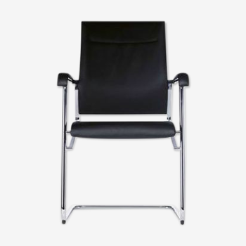 ARMCHAIR MODEL SITO, CHROME, TRIMMED WITH BLACK LEATHER. Ed. WILKHAN