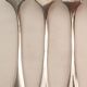 10 mismatched silver metal forks