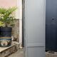 Grey glass-fronted Parisian wardrobe from La Samaritaine 1960