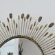 Miroir soleil mural en métal avec perles en résine ambre 1970 style Line Vautrin