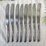 8 vintage stainless steel knives made in France
