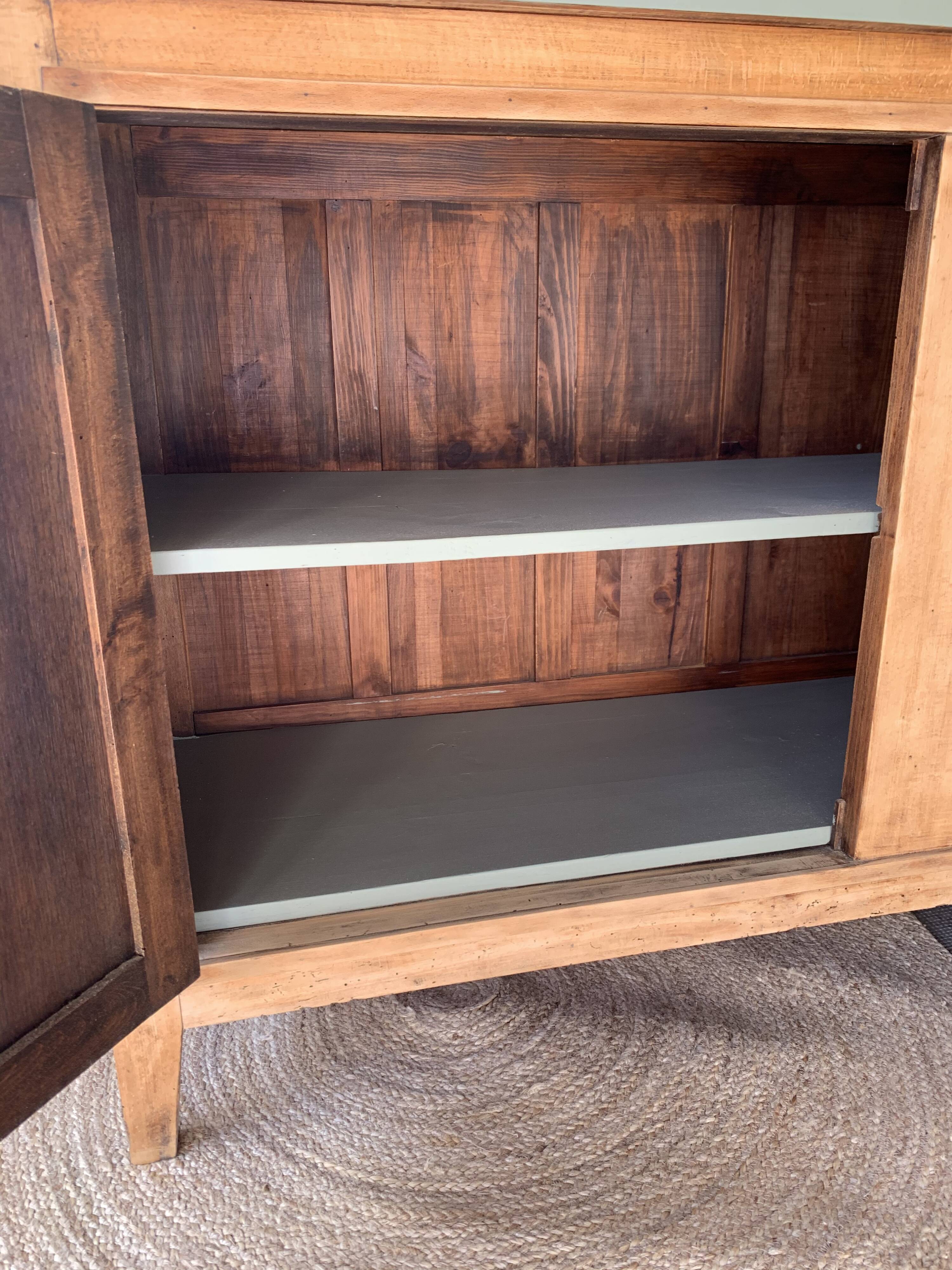 Green buffet and raw wood