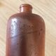 Set of 5 antique glazed stoneware bottles