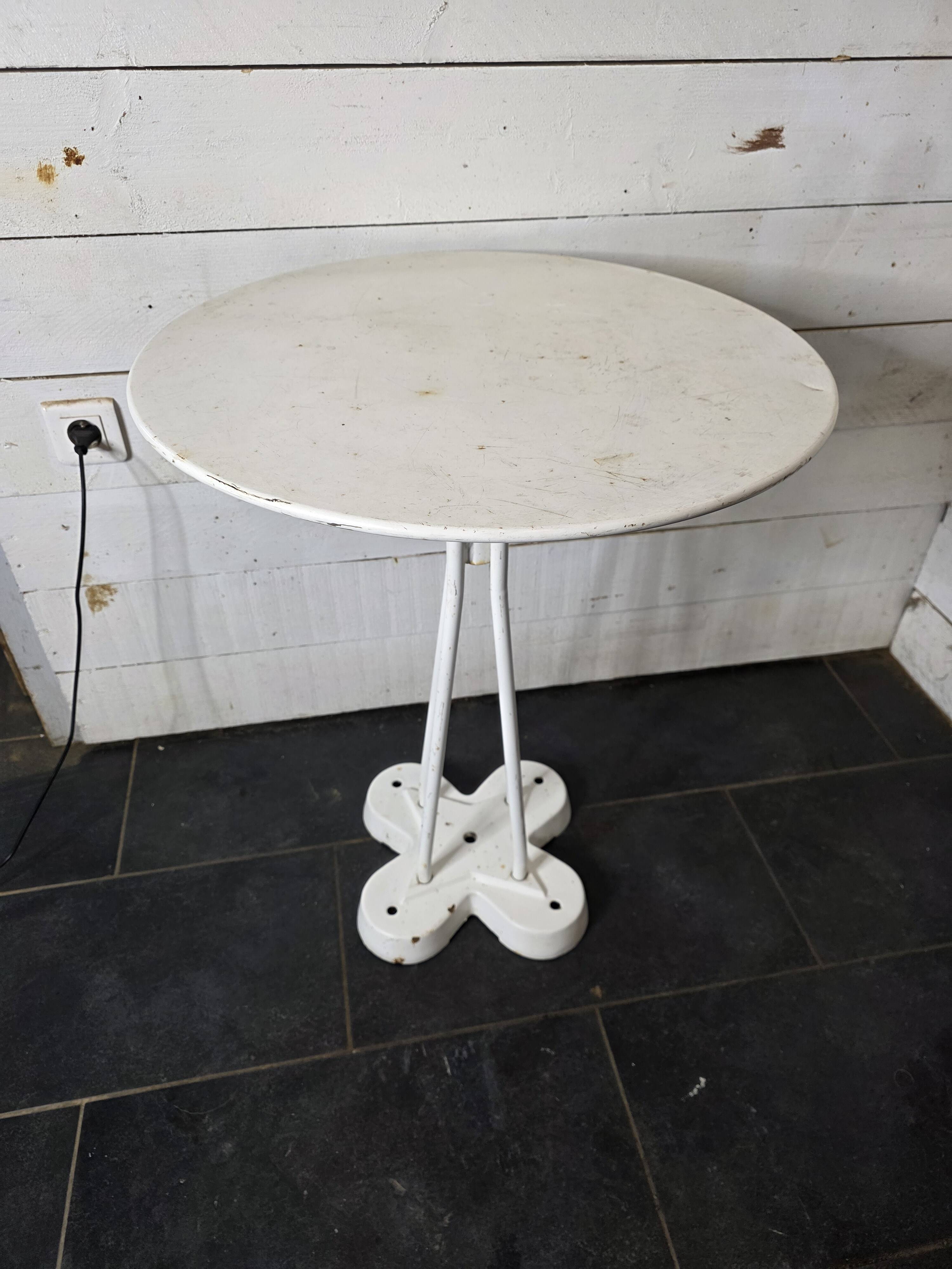 Iron garden table with cast iron legs
