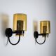 Pair of black metal wall lamps with yellow shades and inner diffuser