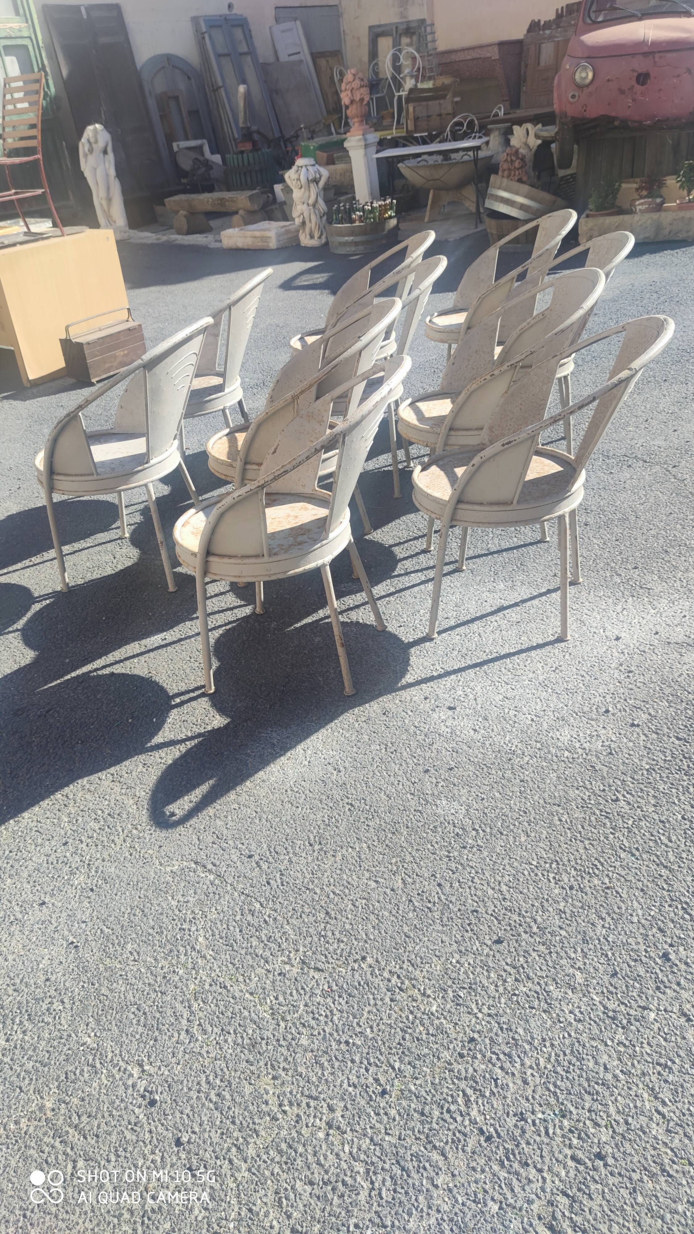 Series of 10 garden chairs made of steel garden patina