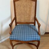 Two Regency-style caned armchairs with upholstered seats