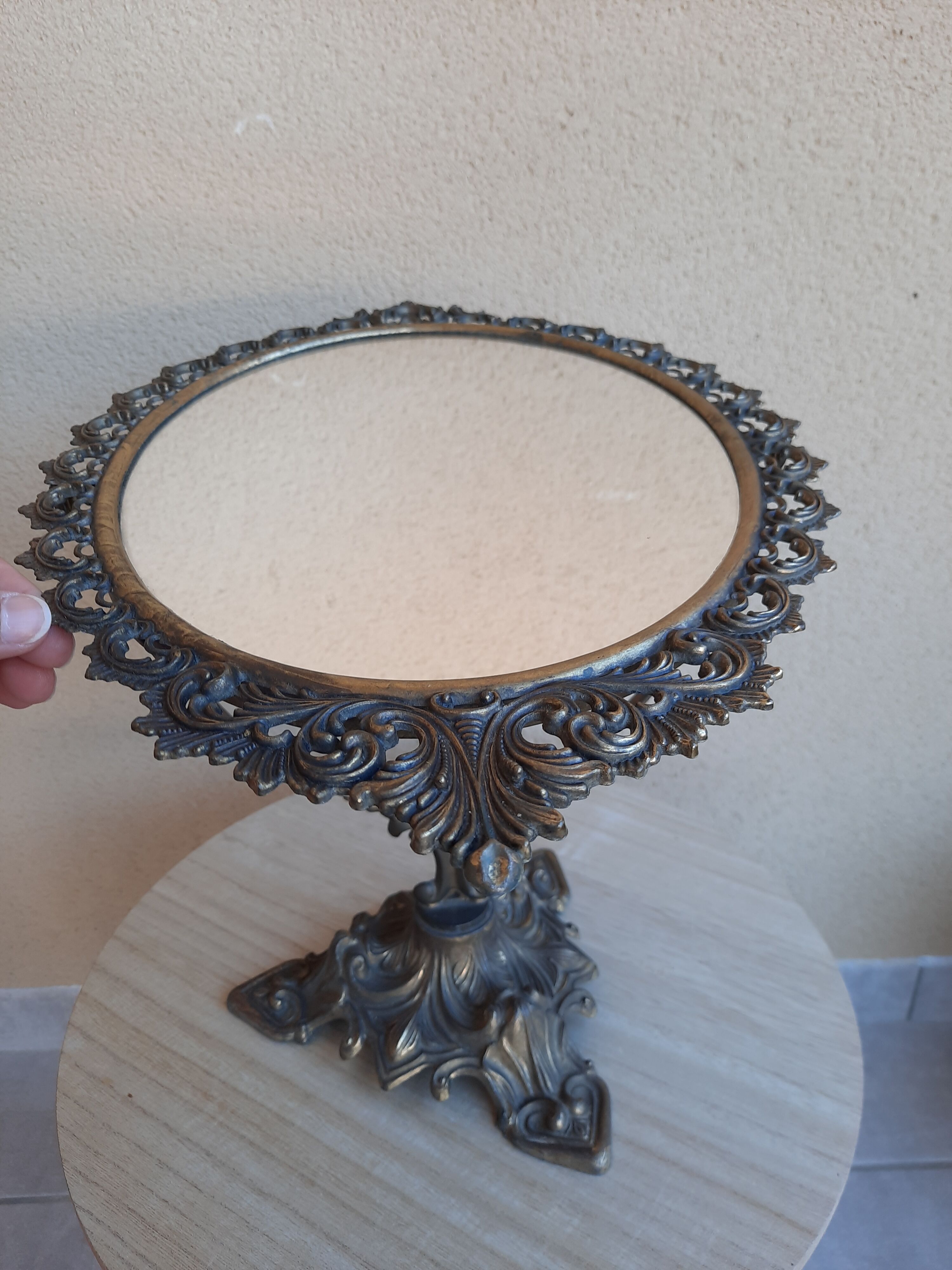 Mirror on foot, swivel, brass, mid-late nineteenth, rock style.