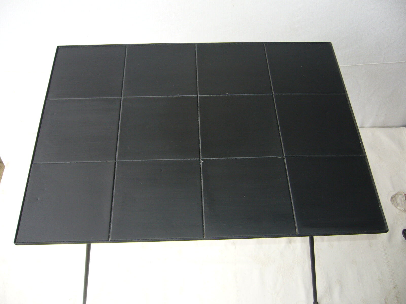 Bout de canapé vintage en métal noir
