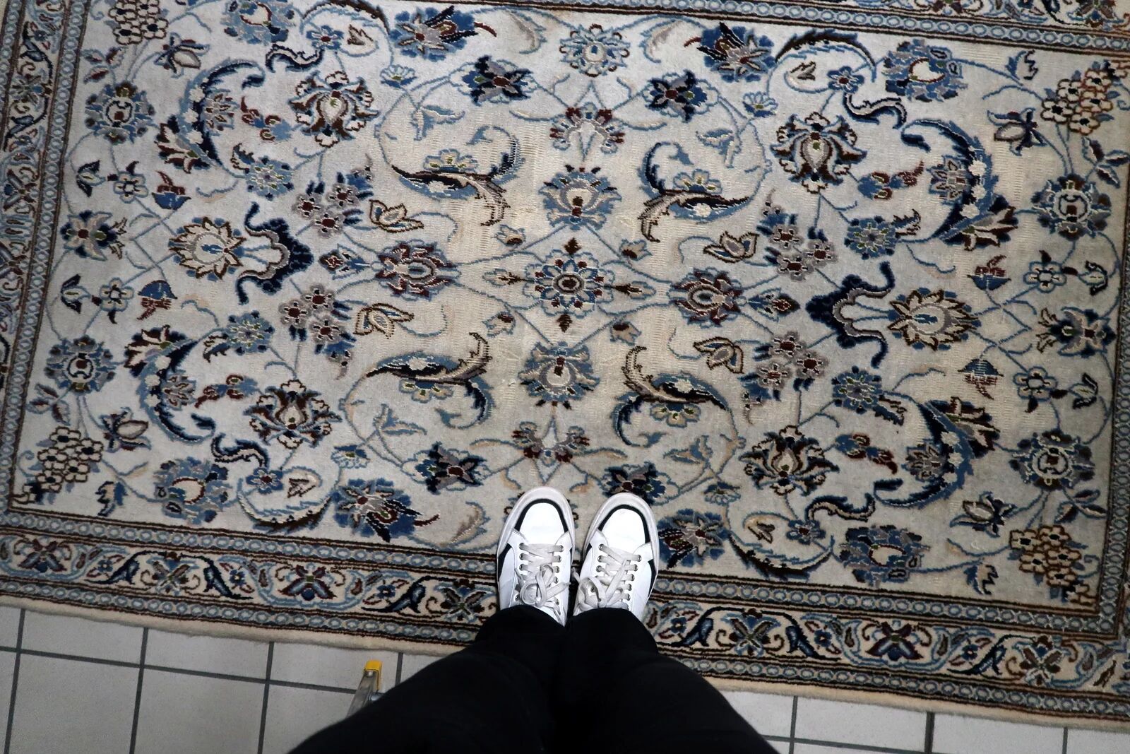 1950s hand-knotted wool rug with silk highlights, ivory and blue, 118 × 200 cm