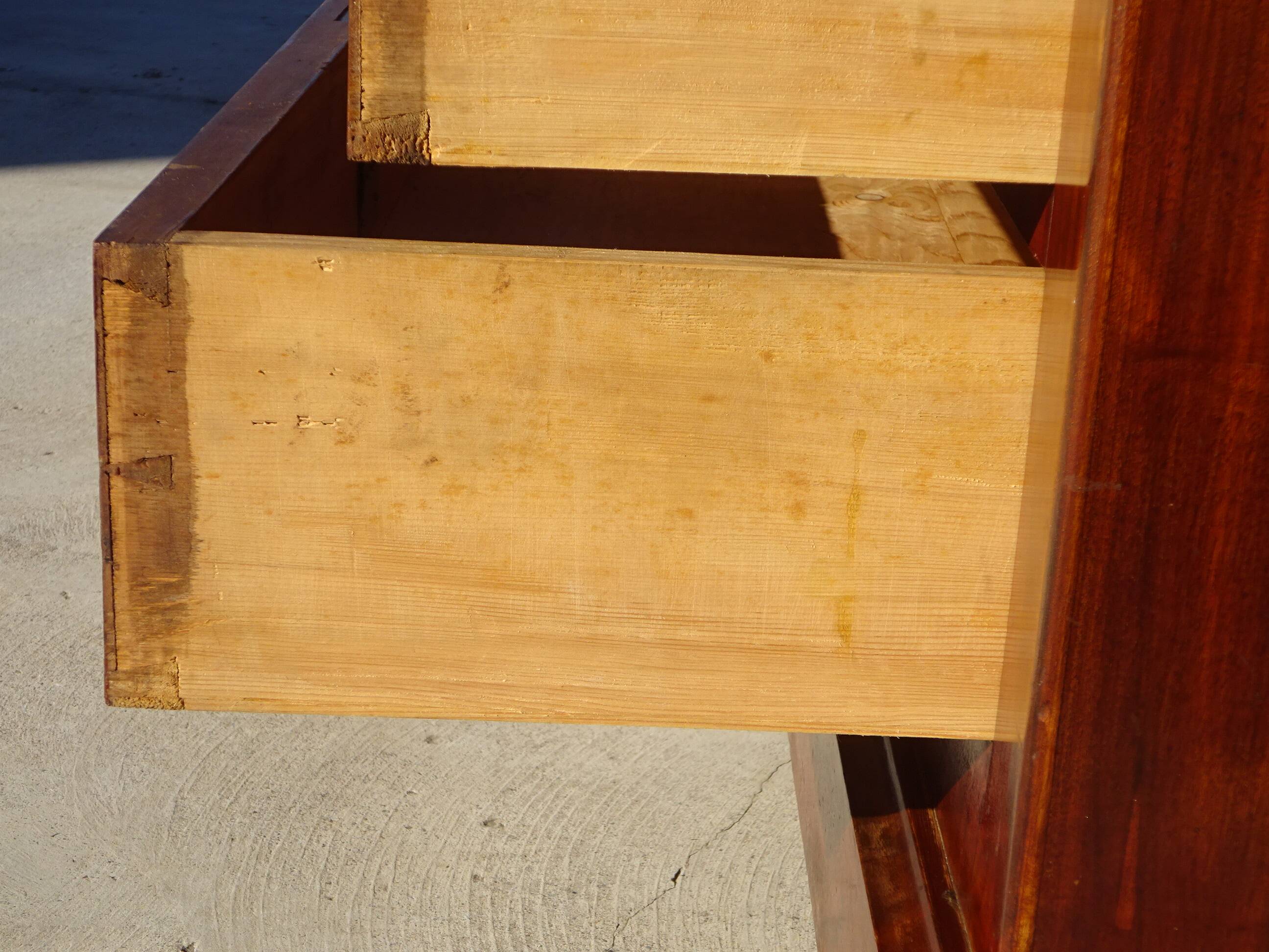 Antique mahogany chest of drawers with white marble.
