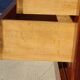Antique mahogany chest of drawers with white marble.