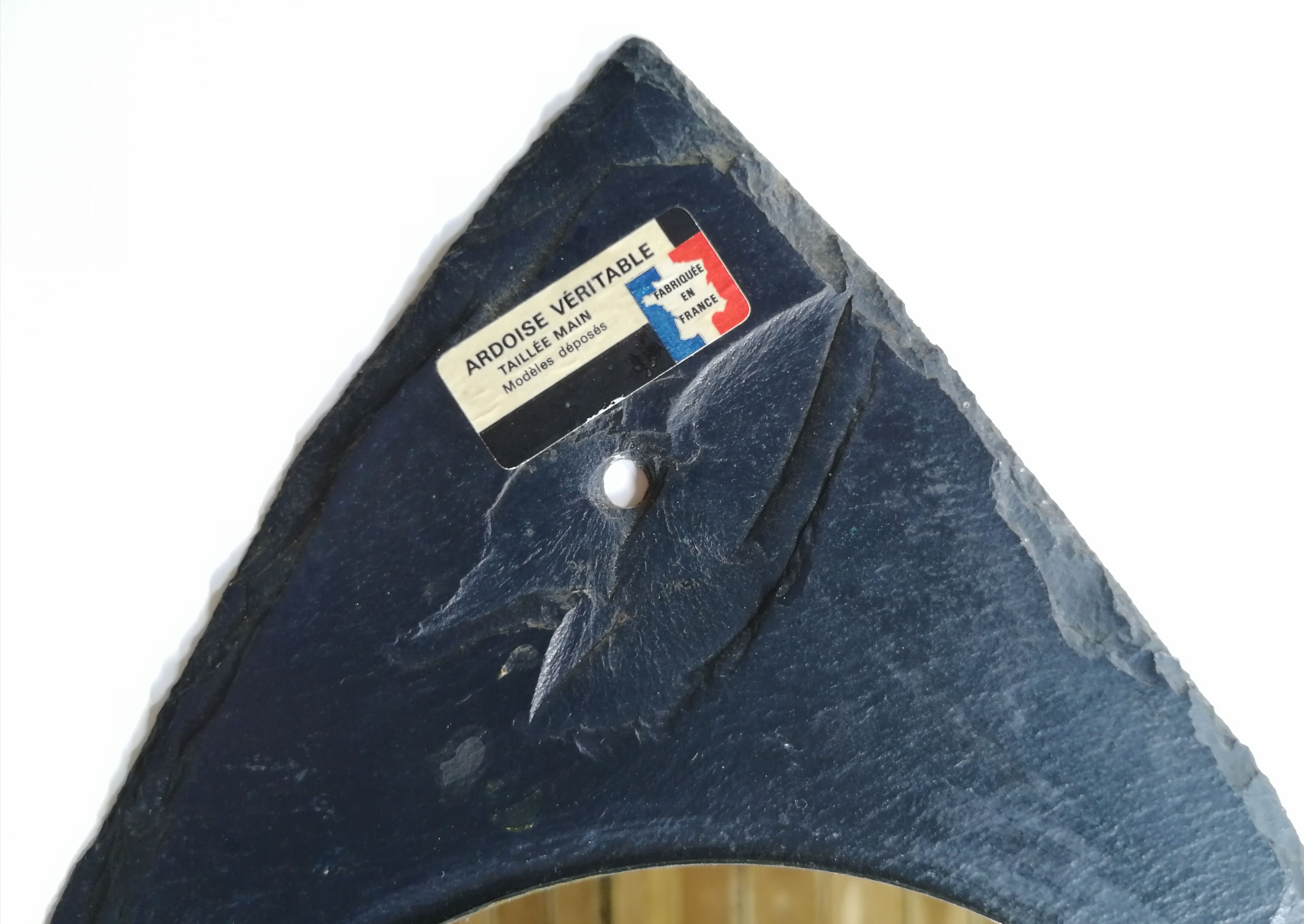 Mirror on hand-cut slate