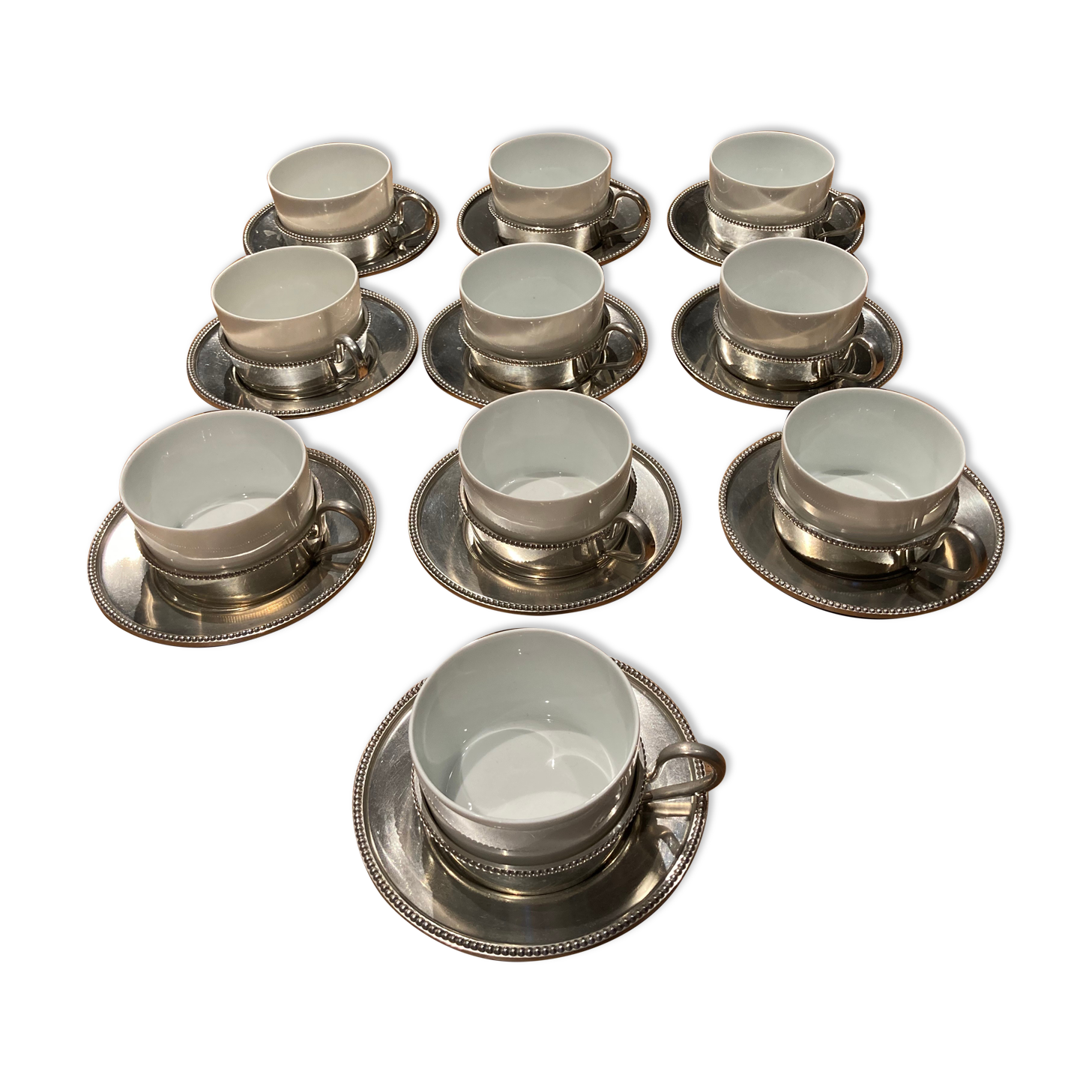 10 cups limoges and under cups in brushed tin