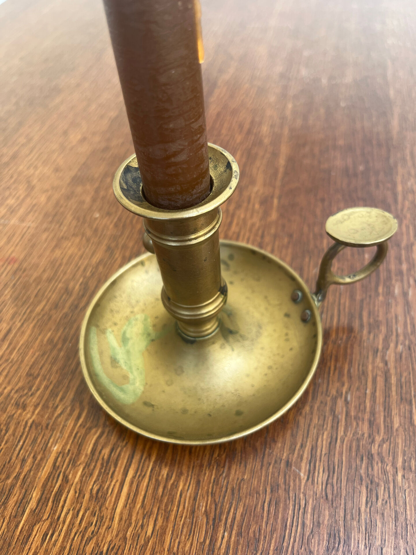 Antique push candle holder