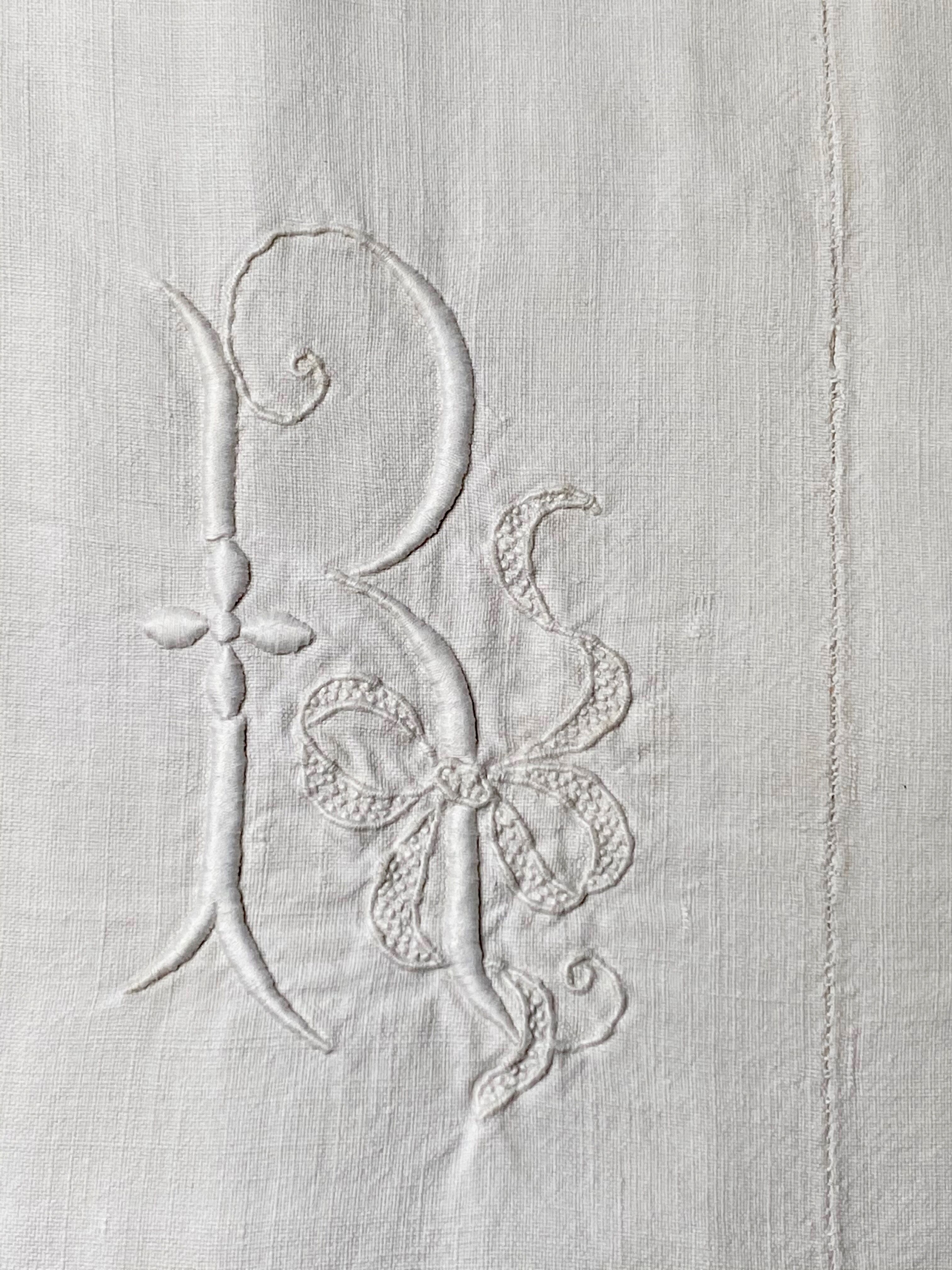 Old sheet with monogram