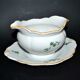 Saucière verseuse vintage en porcelaine ornée de trèfles vert