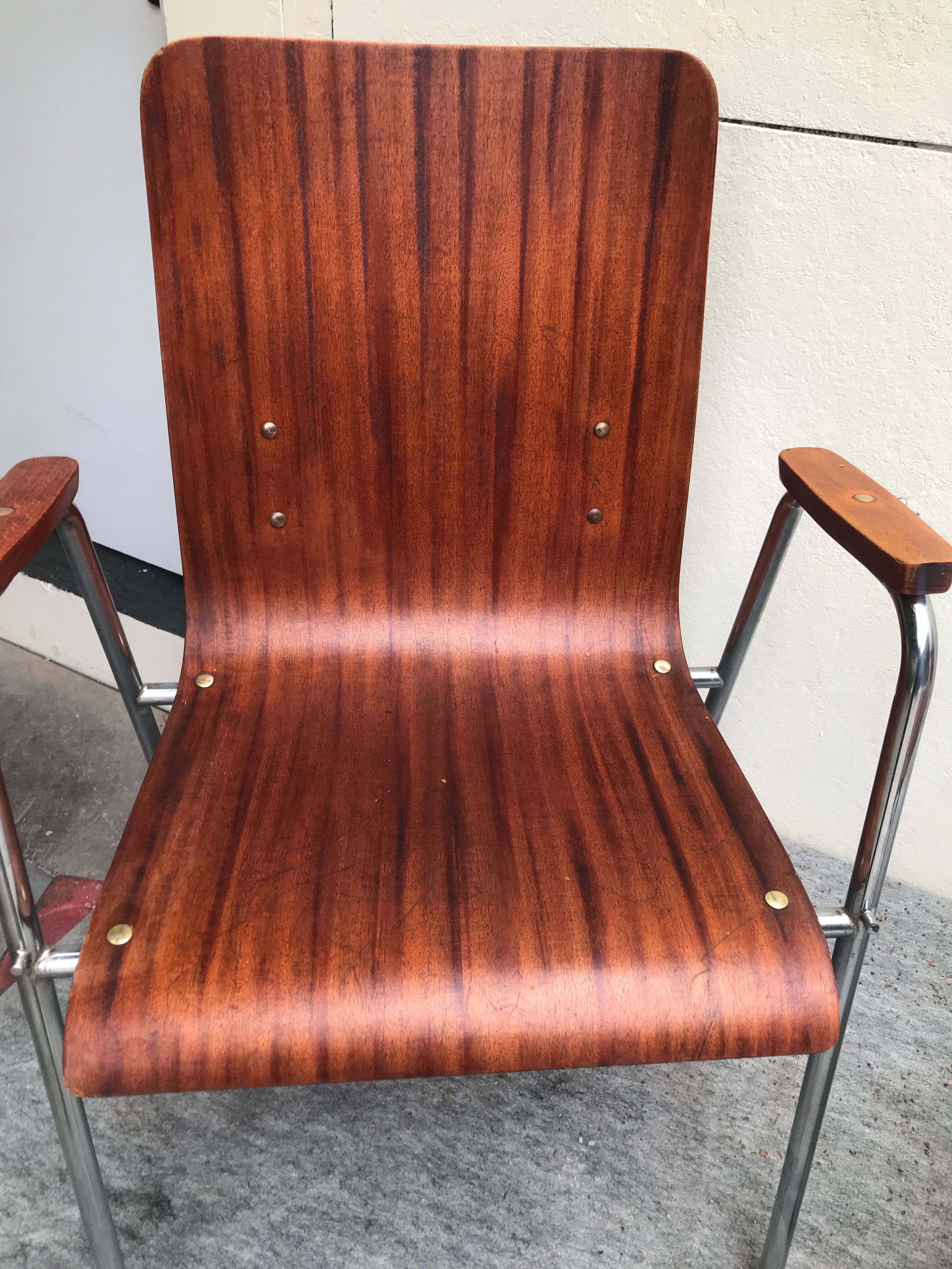Chairs with multi-fold wooden armrest