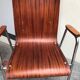 Chairs with multi-fold wooden armrest