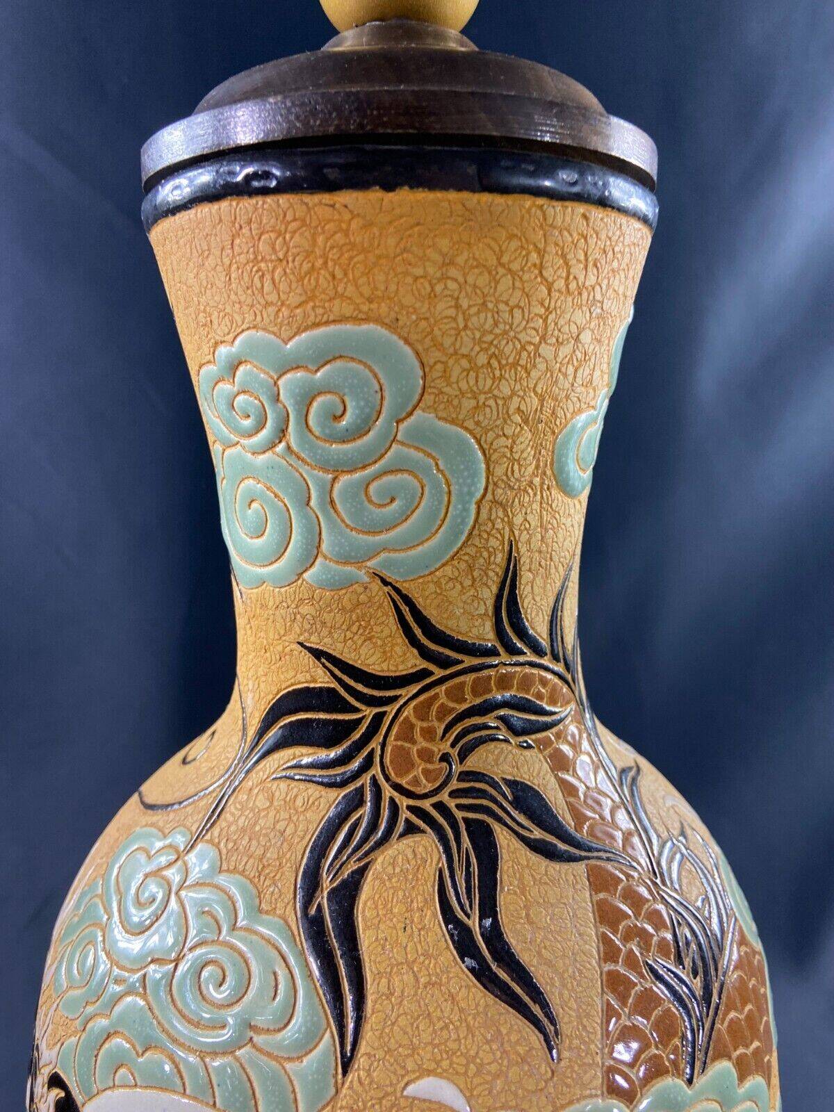 Very large dragon lamp on a yellow background in well-fired Vietnamese stoneware.