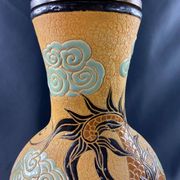 Very large dragon lamp on a yellow background in well-fired Vietnamese stoneware.