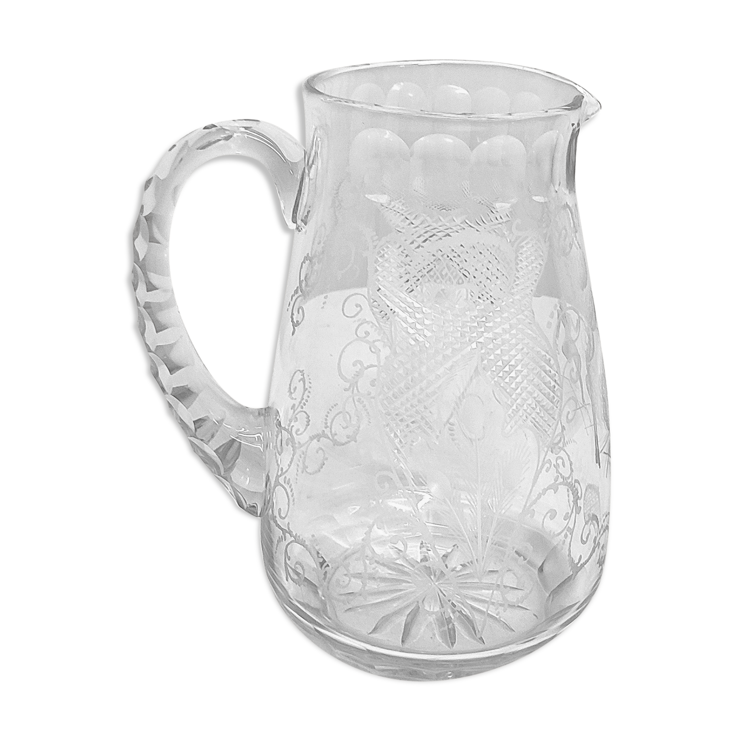 Hand-carved glass jug. France, 1950s.