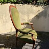 Fauteuil Voltaire XIX ème siècle, en noyer d'époque Louis Philippe, récemment recouvert.