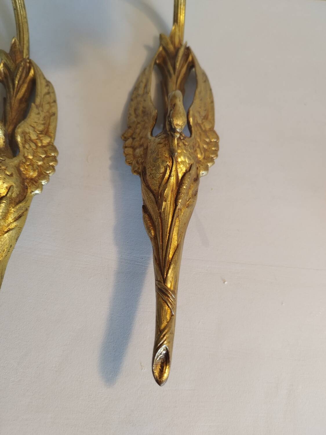 Pair of bronze swan and pink tulip wall lights in glass paste